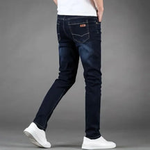 Calça jeans longa reta Tazzani